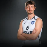 Portrét Tomáše Bělohradského v dresu Wolves Radotín s číslem 6.